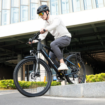 Cyclist on the HITWAY BK7S E-Bike navigating city streets, showcasing its performance and agility.