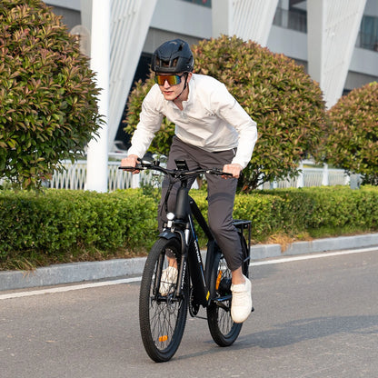 Man on HITWAY BK7S E-Bike speeding down the road, highlighting its power and convenience.